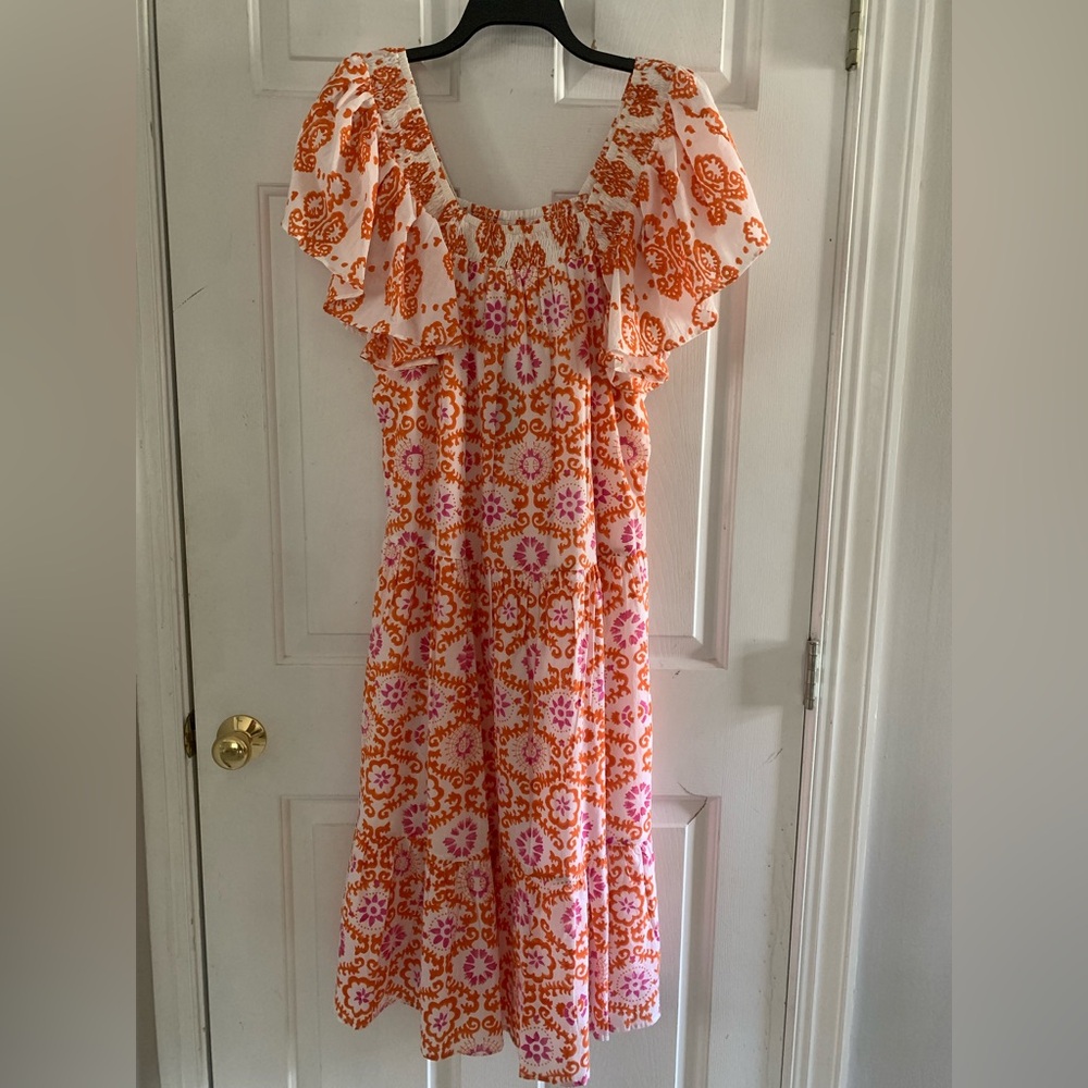 Ro’s Garden Jenna midi dress. Versatile. Can be worn on or off shoulder.